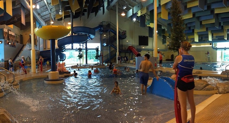 Campers enjoying waterslides at Steinbach Aquatic Centre