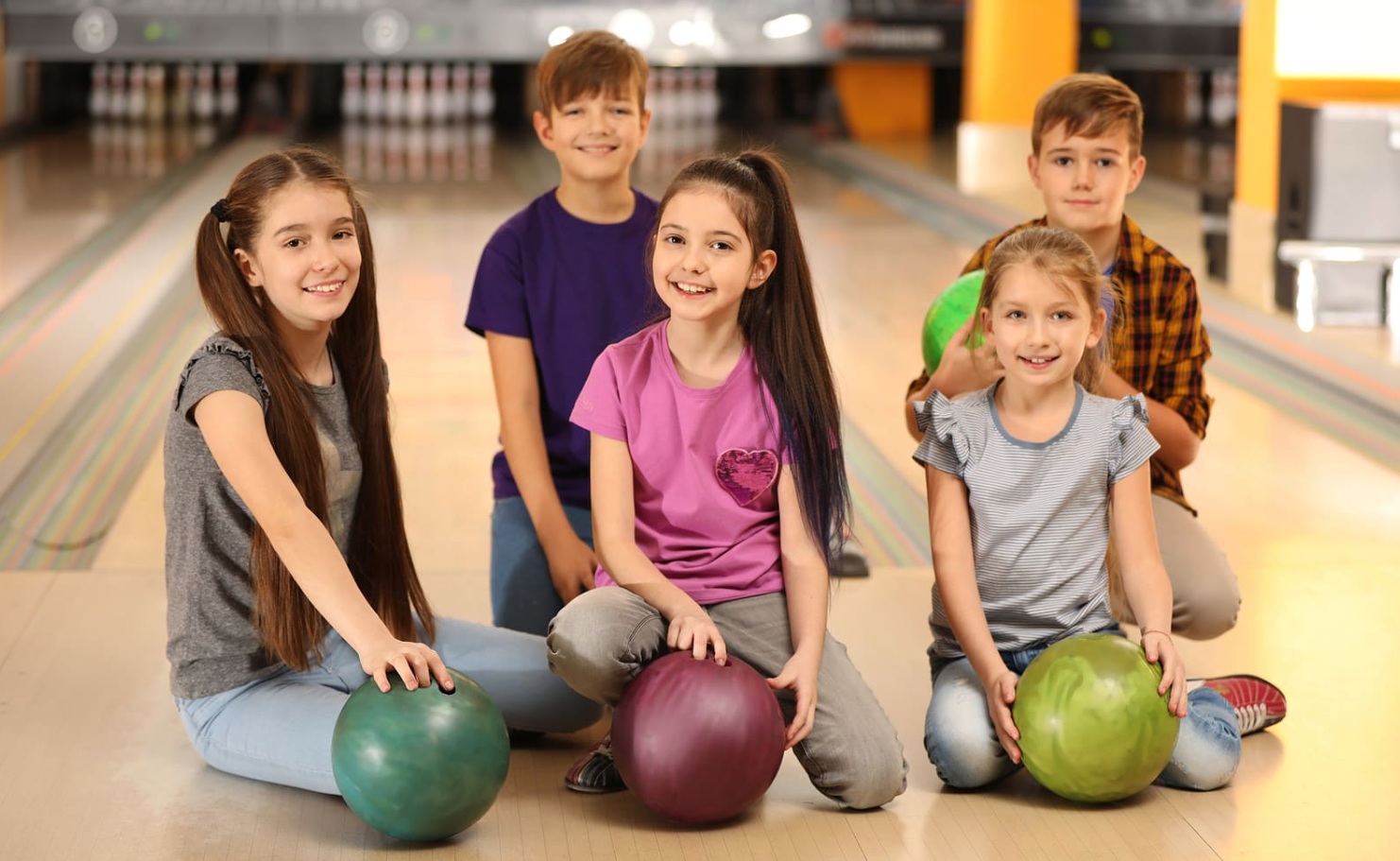 Campers enjoying bowling team activity