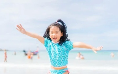 Children building sandcastles at Grand Beach Manitoba